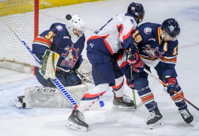 Rivermen goaltender Nick Latinovich blocks a deflected puck against Evansville in the first period of Game 2 of the SPHL President's Cup semifinals Friday, April 19, 2024 at the Peoria Civic Center.