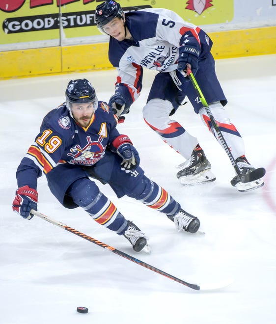 Peoria's Zach Wilkie (19) moves the puck against Evansville's Lincoln Hatten in the first period of Game 2 of the SPHL President's Cup semifinals Friday, April 19, 2024 at the Peoria Civic Center. The Rivermen advanced to the finals with a 5-2 win.