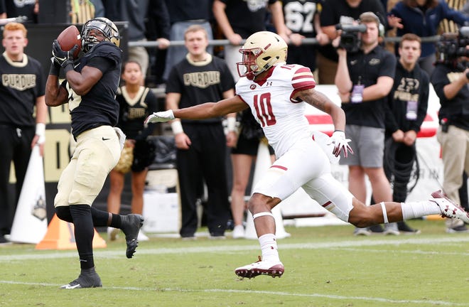 Terry Wright of Purdue with a second half touchdown reception in front of Brandon Sebastian of Boston College Saturday, September 22, 2018, in Ross-Ade Stadium. Purdue defeated Boston College 30-13.