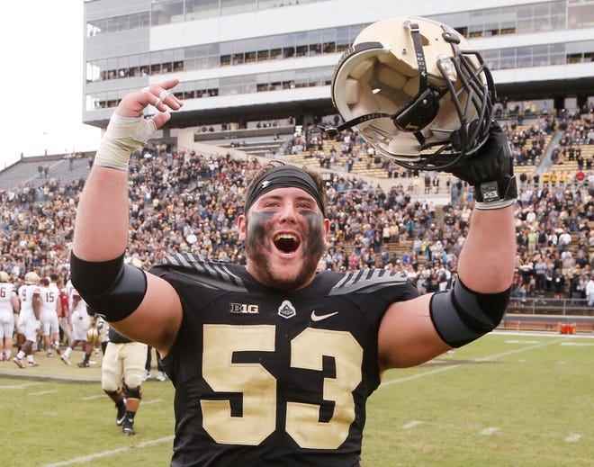 Purdue center Kirk Barron celebrates after the Boilermakers defeated Boston College 30-13 Saturday, September 22, 2018, in Ross-Ade Stadium.