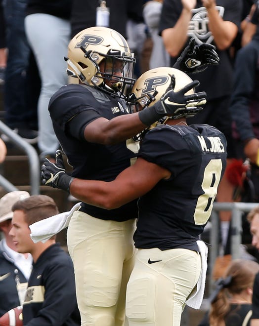 Terry Wright of Purdue celebrates with Markell Jones after his second half touchdown reception against Boston College Saturday, September 22, 2018, in Ross-Ade Stadium. Purdue defeated Boston College 30-13.