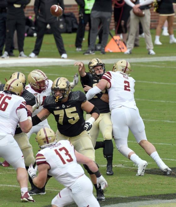 Purdue's David Blough is hit while throwing in Purdue's 30-13 win in West Lafayette on Saturday September 22, 2018.