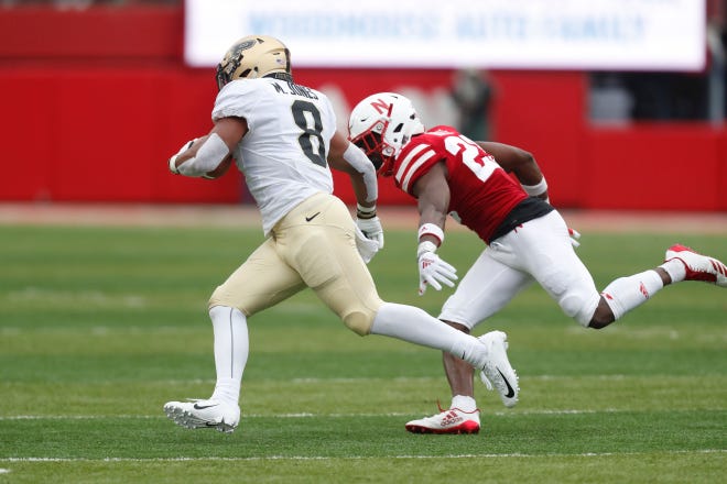 Sep 29, 2018; Lincoln, NE, USA; Purdue Boilermakers running back Markell Jones (8) gets away from Nebraska Cornhuskers cornerback Decaprio Bootle (23) in the first half at Memorial Stadium. Mandatory Credit: Bruce Thorson-USA TODAY Sports