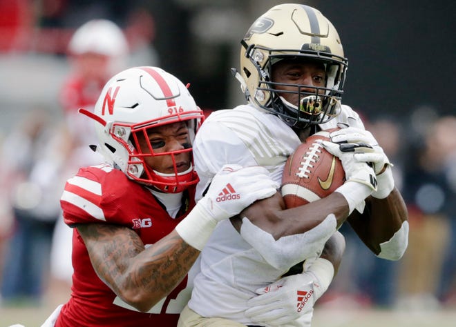 Purdue wide receiver Isaac Zico (7) is tackled by Nebraska defensive back Lamar Jackson (21) during the first half of an NCAA college football game in Lincoln, Neb., Saturday, Sept. 29, 2018. (AP Photo/Nati Harnik)