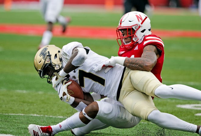 Nebraska defensive back Lamar Jackson (21) tackles Purdue wide receiver Isaac Zico (7) during the first half of an NCAA college football game in Lincoln, Neb., Saturday, Sept. 29, 2018. (AP Photo/Nati Harnik)