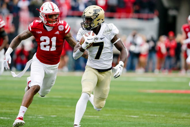 Purdue wide receiver Isaac Zico (7) runs away from Nebraska defensive back Lamar Jackson (21) during the first half of an NCAA college football game in Lincoln, Neb., Saturday, Sept. 29, 2018. (AP Photo/Nati Harnik)