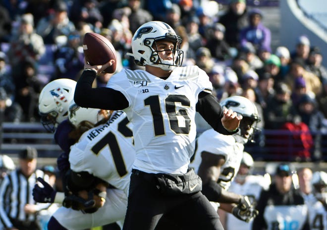 Nov 9, 2019; Evanston, IL, USA; Purdue Boilermakers quarterback Aidan O'Connell (16) passes against the Northwestern Wildcats during the first quarter at Ryan Field. Mandatory Credit: David Banks-USA TODAY Sports