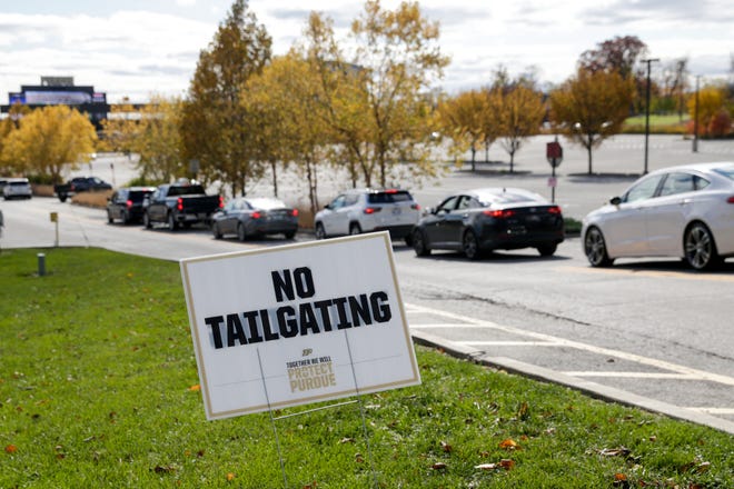 "No Tailgating" is posted at an entrance to Purdue University's Ross-Ade Stadium, Saturday, Oct. 24, 2020 in West Lafayette.