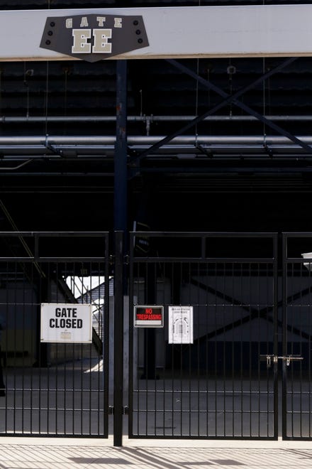 A sign reads "gate closed" at an entrance to Purdue University's Ross-Ade Stadium, Saturday, Oct. 24, 2020 in West Lafayette.